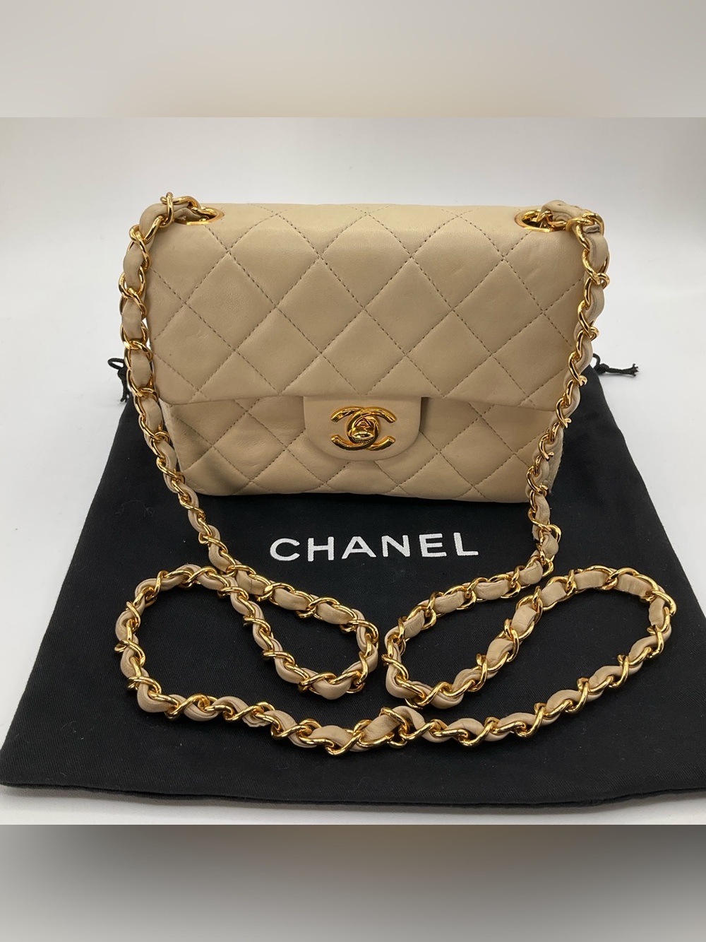 Chanel Classic Mini Flap Beige Quilted Lambskin Leather Gold Chain Shoulder Bag